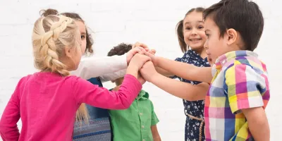 Cooperative Play for Social Development